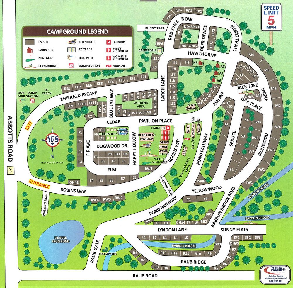 Campground map showing every numbered site along the roads, the pool, Black Bear Pavilion, office, store and game room, 9-hole mini golf, playgrounds, dog park, RC track, walking trails, Babblin Brook and Lil Bull Frog Pond. The entrance and exit are on Abbotts Road.